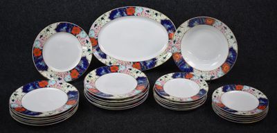 a lot of plates that are sitting on a table
