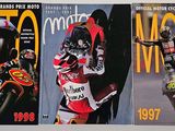 three books of motorcyclist magazine covers on a table