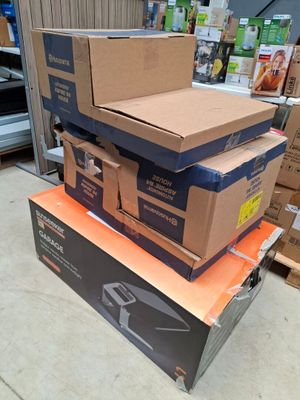 many boxes stacked on top of each other in a store