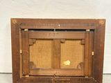 an old wooden picture frame with a picture of a cat in it