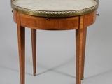 an image of a small table with a marble top and wooden legs
