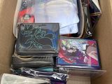 a cardboard box filled with many different types of cards