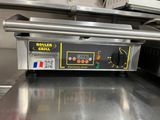 an image of a conveyor belt in a commercial kitchen