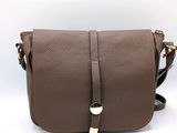 a brown leather cross body bag with a gold buckle