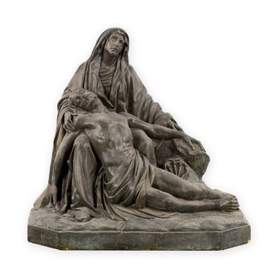 statue of a woman laying on a man ' s back on a marble base