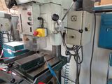 a machine that is working on a piece of metal