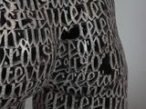 a statue of a man made out of letters