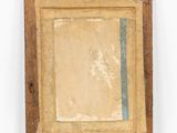 an old painting hanging on a wooden frame on a white wall
