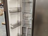an image of an open refrigerator in a warehouse