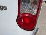 a close up of the tail light of a white car