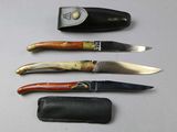 four different types of knives on a table