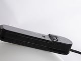 a close up of a cell phone connected to a charger