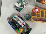 many different items in the container on the table