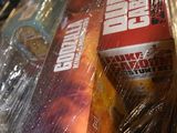 a box of food wrapped in plastic sitting on a table