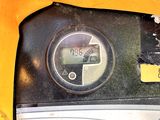 a close up of a meter with a clock on it