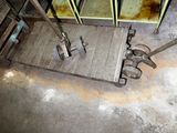 a pair of tools that are on the floor