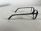 glasses on a table with a white surface and a white background