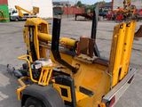 an image of a forklift parked in a parking lot