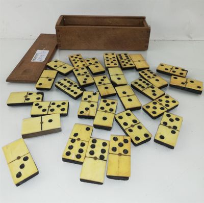 a box full of dominos sitting on top of a table