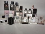 many different types of perfume bottles on the table