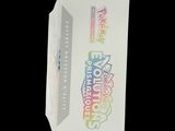 a white box that has a sticker on the side of it
