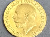 l'image d'une pièce d'or sur laquelle figure le visage d'un homme