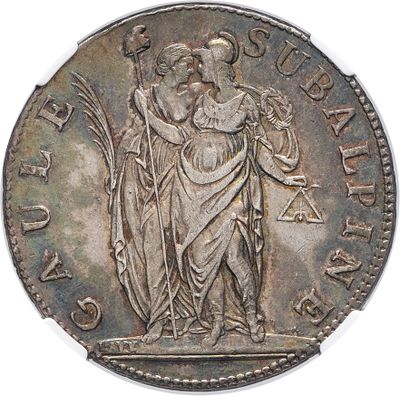 a close up of a coin with a man holding a sword