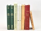 a few books that are stacked on top of each other
