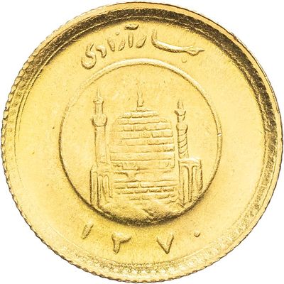 une image représentant une pièce d'or sur laquelle figure l'effigie d'un bâtiment
