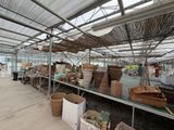 many baskets and baskets on the shelves in the room