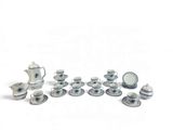 a picture of a collection of porcelain tea and coffee sets