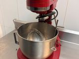 an image of a red mixer on a kitchen counter