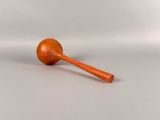 an image of a wooden ball and a wooden stick on a white surface
