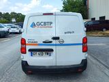 a white van parked on the side of the road