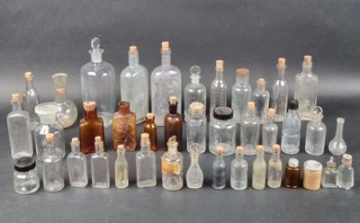 a lot of bottles that are sitting on a table