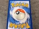 a close up of a pokemon book on a table
