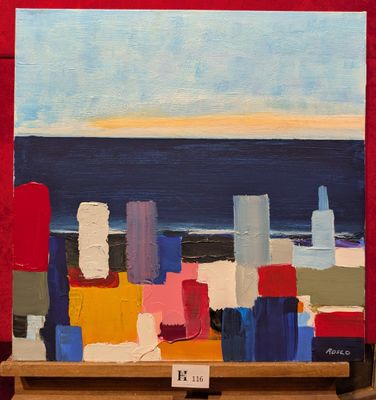 un tableau exposé sur une étagère