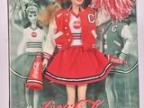Poupée Barbie Coca-Cola en tenue de pom-pom girl avec des pompons
