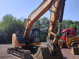 a picture of a tractor and a bulldozer in a parking lot