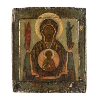 une peinture ancienne représentant une femme tenant un bébé dans ses bras