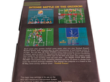 a book with a picture of a football game on it