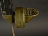 a close up of a metal object on a pole