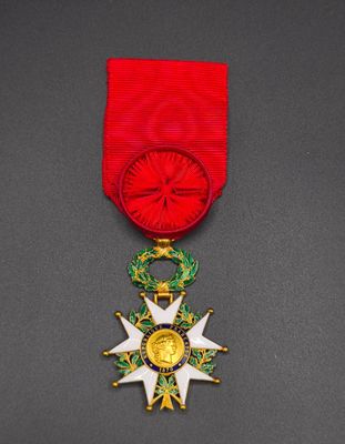 a close up of a medal with a star on it