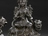 pair of chinese silver figurines of a seated woman and a lion