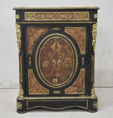 a black and gold cabinet with a painting on it