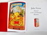 an open book with a picture of a globe on it