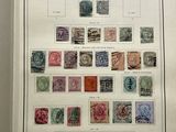 an open book with a bunch of different stamps on it