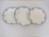 three plates that are sitting on a table