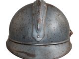 a metal helmet with a horse ' s head sticking out of it