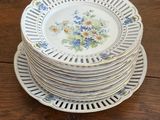 several plates stacked on top of each other on a wooden table